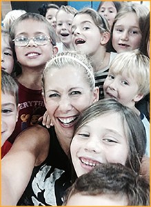 Vanessa Berry and K-3 students during a Halloween flash mob rehearsal.